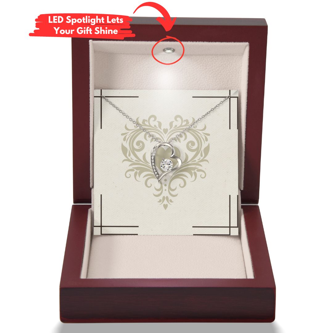 forever heart shown in a mahagony style luxury box with an led light